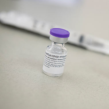 Photo shows a vile of the Pfizer COVID-19 vaccine.